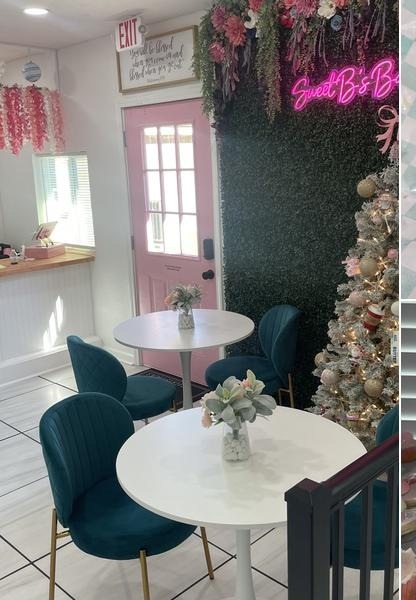 Pink bakery interior with hanging flowers and green chairs at Sweet B's Bakery in Cove, Texas